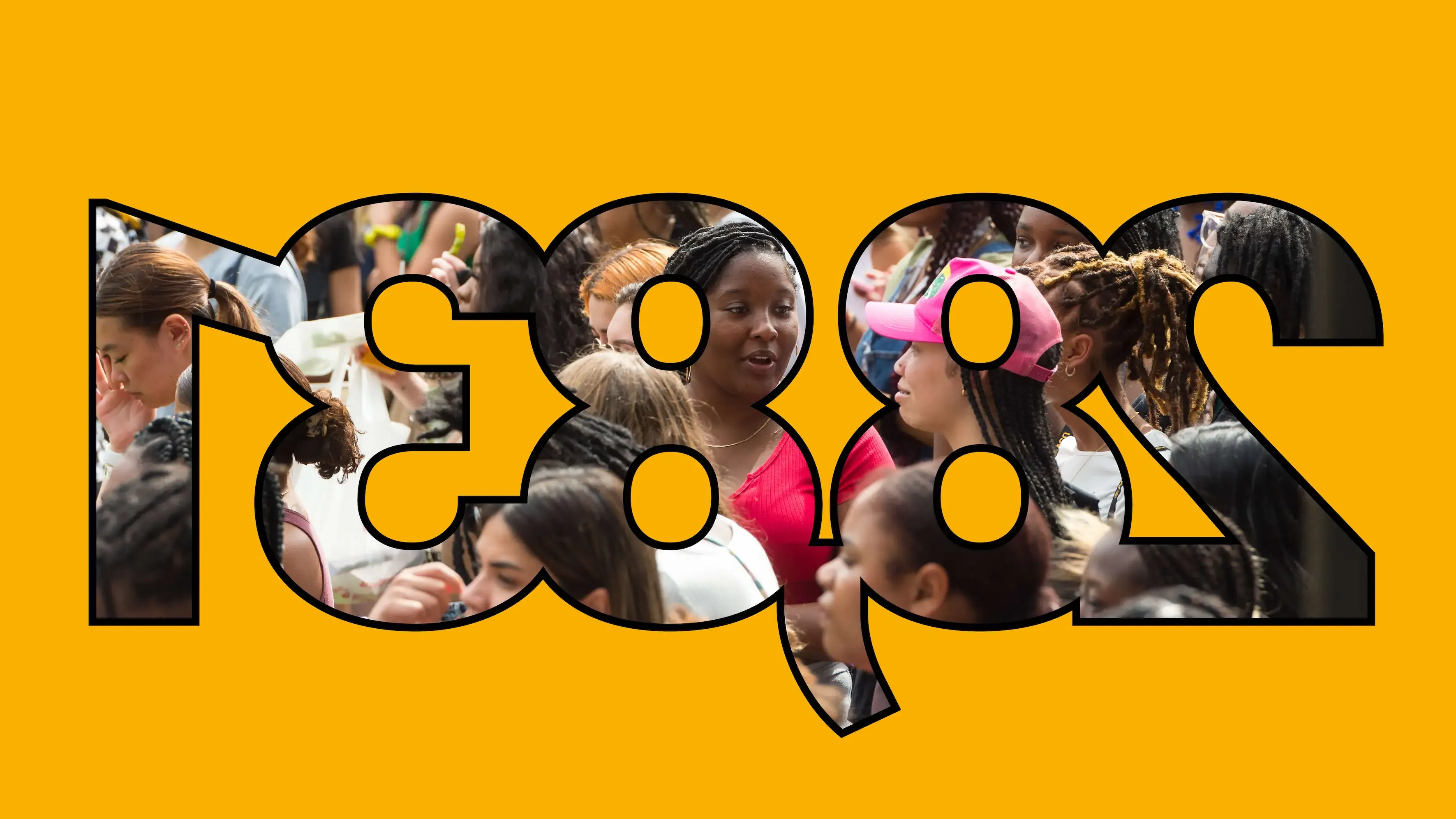 Large graphic image of the number 28,831, filled by a photo of smiling VCU students.